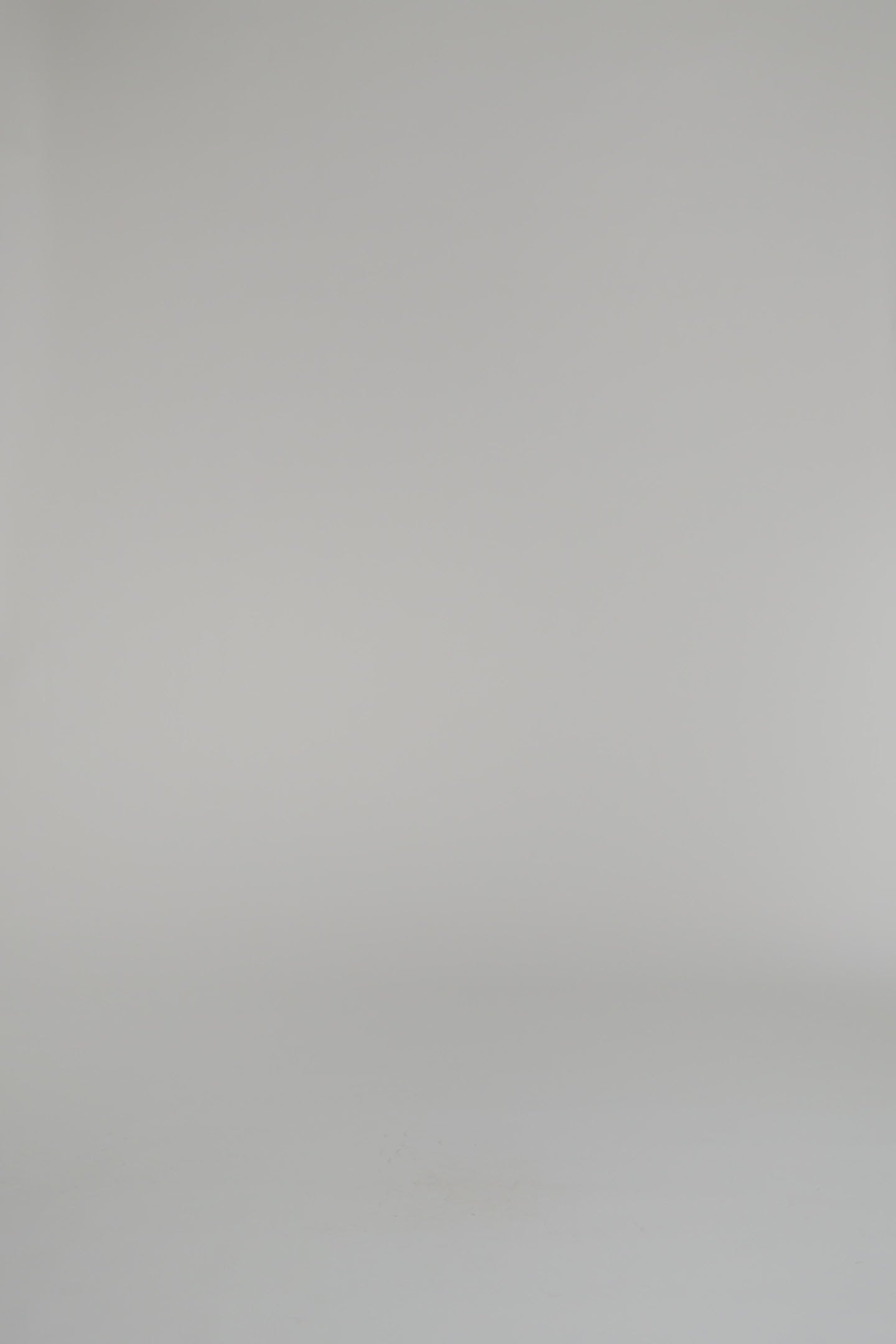 woman wearing blue tee and skirt on a white background