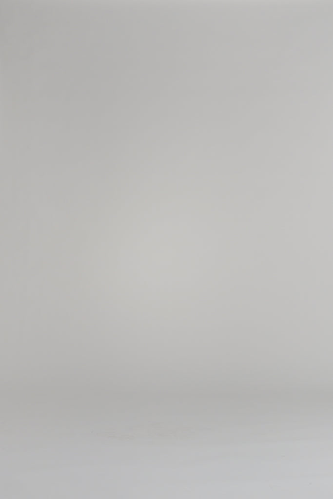 woman wearing floral outfit on white background