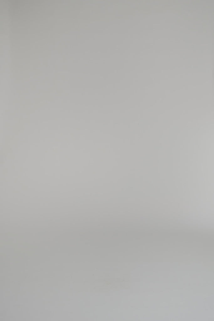 woman modeling red and white set on a white background