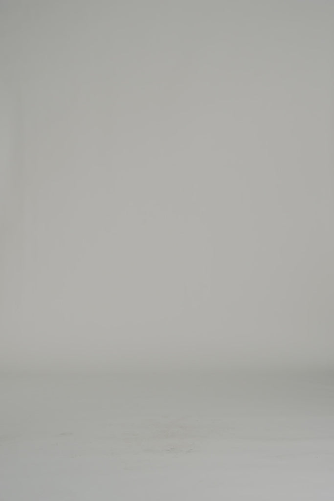 woman modeling wrap skirt on a white backdrop